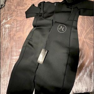 Black XL Sweat Jumpsuit from Joi chaves. Comes with breathable pouch.